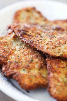 some fried food is on a white plate