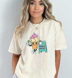 Ice cream shirt, Sunday Fun Day Shirt, Ice Cream Gift, Ice Cream Gifts, Ice Cream kids shirt, 60s Fashion, 60s t shirt, retro 60s shirt, cartoon character, retro graphic tshirts, retro shirt women, retro shirt men, retro graphic, aesthetic shirt, Vintage Graphic tee, character tee, teen food shirt, Funny food shirt,  Sundae Fun Day is a classic Retro Comfort Colors tshirt. It's for ice cream lovers big and small, and is fashionable for all different types of outfits.  This durable t-shirt feels Retro Short Sleeve T-shirt With Graphic Print, Summer Graphic Tee With Character Print, Retro White T-shirt With Funny Print, Trendy Cotton T-shirt With Retro Print, Fun Crew Neck Shirt With Screen Print, Fun Relaxed Fit Shirt With Character Print, Casual Relaxed Fit T-shirt With Retro Print, Retro Summer Tops With Character Print, Fun Short Sleeve Tops With Cartoon Print