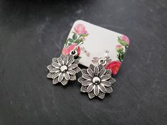 These earrings feature detailed Tibetan silver flower charms on French hook earwires. The overall length is 1 1/4 inches. Earwires Finish  ~ Silver Plated  ~ Sterling Silver Silver Flower Earrings, Earrings Antique, Flower Jewelry, Unique Gifts For Her, Antique Earrings, Flower Charm, Silver Flowers, Flower Jewellery, Flower Earrings