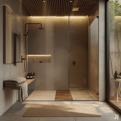 a bathroom with a walk in shower next to a sink