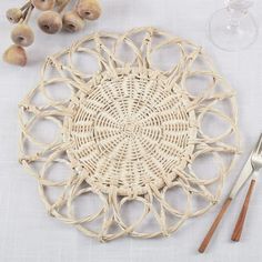 Fennco Styles Hand Twisted Rattan Floral Placemat 15" Round, 1- Piece Add instant boho elegance to your home with this Floral Rattan Placemat. Featuring a flower-inspired design, a subtle natural color finish, and an intricately woven pattern inject texture and warmth to any style. Chic and organic, this rattan placemat infuses an airy, rustic ambiance creating a transformative table design that echoes the beauty of nature. It's a great alternative to a charger plate and perfect for your dinner, Rattan Placemat, Rattan Placemats, Home Boho, Flower Table, Charger Plate, Stylish Tables, Small Potted Plants, Woven Pattern, Casual Dining