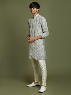 YUVA BY VASTRAMAY Boys' Grey Georgette Chikankari Kurta Pyjama Set This elegant kurta pyjama set features a grey georgette kurta with beautiful chikankari embroidery. The kurta has a mandarin collar, long sleeves, and a button placket. The set comes with matching solid viscose pyjamas for a comfortable and stylish look. Perfect for special occasions or everyday wear. Key Features Grey georgette kurta with chikankari embroidery Mandarin collar Long sleeves Button placket Straight hem with side sl Festive Cotton Sherwani With Printed Motifs, Block Print Long Sleeve Sets For Diwali, Long Sleeve Cotton Sherwani With Dabka, Long Sleeve Churidar With Bandhani Print For Eid, Long Sleeve Bandhani Print Churidar For Eid, Long Sleeve Block Print Sets For Diwali, Cotton Long Sleeve Sherwani For Eid, Cotton Sherwani With Printed Motifs And Long Sleeves, Casual Cotton Traditional Wear For Eid