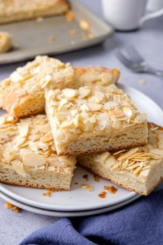 several pieces of cake on a white plate