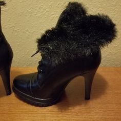 Never Worn Black Short Leather Boot With Soft Black Plush Inside. Can Be Worn 2 Ways, With Top Of Boot Folded Over To Expose Plush Or Straight Up. Winter Ankle-high Heeled Boots With 4-inch Heel, Fitted Lace-up Winter Booties, Winter Closed Toe Heeled Boots With 4-inch Heel, Black Lace-up Booties, Black Fitted Lace-up Booties, Fitted Black Lace-up Booties, Fitted High Heel Winter Booties, Lace-up Winter Booties, Winter Lace-up Fitted Booties