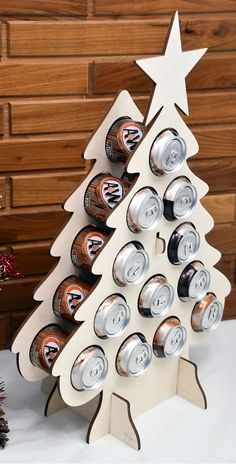 a christmas tree made out of beer cans