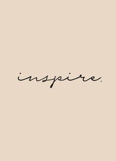 the word inspire written in black ink on a beige background