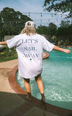 Sail away in the perfect Summer tee! This ultra soft tee will give you all the cozy coastal vibes while keeping you feeling cool & relaxed.  unisex fit Mollie is wearing an XL 100% ring spun cotton garment dyed for that lived in feel pre-shrunk Nautical Cotton T-shirt For Summer, Casual Cotton T-shirt For Sailing, Summer Boating T-shirt With Short Sleeves, Summer Short Sleeve T-shirt For Boating, Casual Short Sleeve Sail Tops, Casual White Top For Sailing, Casual White Tops For Sailing, Casual Summer Tops For Sailing, Nautical Letter Print T-shirt For Summer