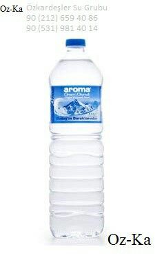 a large bottle of water sitting on top of a table