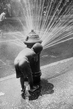 a fire hydrant spewing water into the street