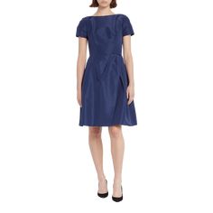 Carolina Herrera cocktail dress in taffeta. Approx. length:  40" from shoulder to hem. Bateau neckline. Short sleeves. Princess seams. Fit-and-flare silhouette. Hem hits about at the knee. Zips at v back. Silk. Lining, polyester/spandex. Dry clean only. Made in USA. Fitted Silk Dresses With Box Pleat, A-line Dress With Fitted Bodice For Occasion Wear, Fitted Silk Dress With Box Pleat, Knee-length Silk Evening Dress, Fitted Satin Dress With Box Pleat, Fitted Taffeta Mini Dress For Formal Occasions, Formal Fitted A-line Silk Dress, Formal Dresses With Pleated Back And Asymmetrical Neckline, Short Sleeve Evening Dress With Pleated Bodice