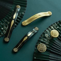 some black and gold items on a green surface