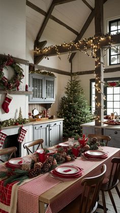 a dining room table set for christmas dinner