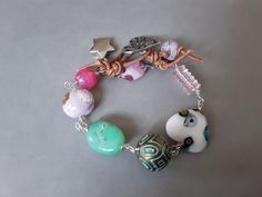 Wire wrapped eclectic mix of Chrysoprase nugget,  Millefiori Heart, vintage pink, Cherry Quartz and Pewter heart/bee button Pink Heart-shaped Bohemian Bracelets, Pink Bohemian Heart-shaped Bracelets, Heart Vintage, Cherry Quartz, Turtle Bracelet, Hippie Bracelets, Pink Cherry, Owl Necklace, Boho Bracelet