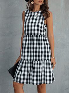 Fashion Round Neck Plaid Loose Female Plaid Dress Cake Skirt Sleeveless Plaid Dress With Ruffle Hem, Plaid Sleeveless Dress With Ruffle Hem, Casual Fitted Midi Dress With Tiered Skirt, Casual Black Skirted Dress, Casual Black Tiered Midi Dress, Casual Skirted Dress With Ruffle Hem, Casual Black Tiered Skirt Dress, Casual Tiered Sleeveless Dress For Day Out, Casual Non-stretch Tiered Dress