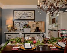 the dining room table is set for christmas dinner