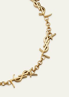 Saint Laurent Multi YSL Logo Bracelet Ysl Travel Mug, Yves Saint Laurent Party Theme, Yellow Gold Chain Link Jewelry With Gold-tone Logo, Elegant Gold-tone Chain Link Jewelry With Logo Plaque, Elegant Gold-tone Chain Link Jewelry, Designer Gold Metal Chain Bracelet, Designer Gold Chain Bracelet, Designer Gold Bracelets With Logo Charm, Gold-tone Chain Link Jewelry With Logo Charm