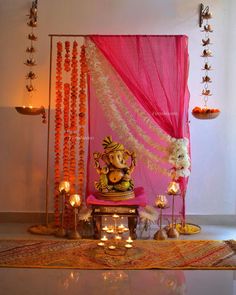 a decorated stage with candles and decorations