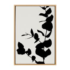 a black and white painting with leaves on it's side in a wooden frame