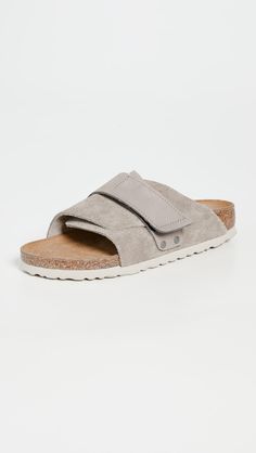 Leather: Cowhide Suede Molded Footbed Regular Fit Velcro Strap Open Toe Rubber Sole Made In Germany This Item Cannot Be Gift-Boxed | Birkenstock Kyoto Suede Sandals Birkenstock Kyoto, Flats With Arch Support, Suede Slides, Birkenstock Sandals, Suede Flats, Suede Sandals, Velcro Straps, Sandal Espadrille, Slide Sandals