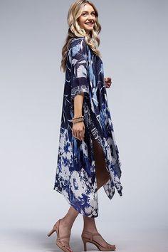 This kimono has a stunning all over floral print in a beautifull colorway! - 100% Viscose - 38"x40" - One size fits all Elegant Blue Floral Print Kimono, Blue Floral Print Kimono, Holiday Glam Outfits, Blue Printed Silk Kimono, Party Bottoms, Monochromatic Design, Blue Printed One-size Kimono, Night Out Tops, Silk Floral Print Maxi-length Kimono