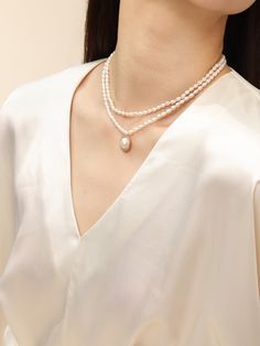 Introducing the "COCOKIM Embellished Series Double-Layer Pearl Necklace," a must-have accessory for pearl lovers. This necklace embodies princess elegance with its graceful double-layer design and sweet sophistication.Whether you're dressing up for a special occasion or adding a touch of elegance to your everyday look！ Metal: 14K Gold Filled Gemstone: Freshwater Pearl Small Pearl Dimensions: 60*40mm Large Pendant Pearls Dimensions: 180*150mm (including metal parts) Inner Chain Length: 380mm Oute Layered Pearl Necklace, Edison Pearls, Charm Pendant Necklace, Layer Design, Tiger Eye Stone, Layers Design, Stone Necklace, Chain Length, Double Layer