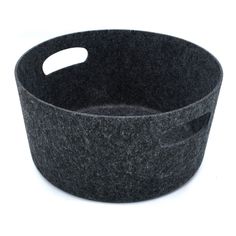 a black felt basket on a white background