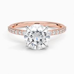 a rose gold and white diamond engagement ring