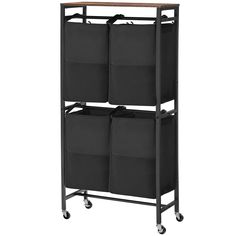 a black shelf with four bins on wheels