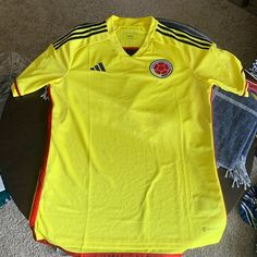 Adidas Columbia National Team Jersey Size L Measurements In The Pictures Adidas Yellow Crew Neck Top, Yellow Adidas Crew Neck Top, Yellow Adidas Sporty Top, Adidas Yellow Sporty Top, Sporty Yellow Adidas Tops, Adidas Yellow Short Sleeve Tops, Adidas Yellow, Team Jersey, Adidas Shirt