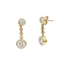 Turn heads with these alluring lab grown diamond studded dangle earrings. Crafted in 14K gold, each round bezel set lab diamond stud dangles a larger stud in a chain link drop. The brilliant round cut lab grown diamonds have a I-J color and VS-SI clarity for a radiant brilliance and 1 1/2 carat total weight that complements any outfit. The Sku number is 456113 IL Certificate is available upon request. Diamond Stud, 2 Carat, Lab Diamonds, Diamond Studs, Bezel Setting, Lab Grown, Chain Link, Lab Grown Diamonds, Gold Diamond