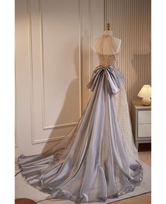 Get 10% off now! Buy noble champagne sequined long halter prom dress with big bow train at cheap price online. Free stable shipping and pro custom service since 2009. Dress With Big Bow, Halter Prom Dress, Prom Dress With Train, Champagne Evening Dress, Halter Prom Dresses, Dress With Train, Fairytale Dress, Big Bow, American People