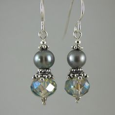 These neutral go with everything earrings feature gray colored crystals and gray colored freshwater pearls and Bali beads.  All solid sterling silver, 1.5 inch total length.  Domestic shipping is free. Pearl Bead Earrings, Crystal Jewelry Diy, Creative Earrings, 2024 Jewelry, Pearl Art, Women Necklaces, Beaded Earrings Diy, Diy Jewelry Unique, Vintage Jewelry Crafts