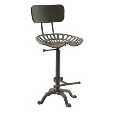 an adjustable stool with a black seat and foot rest