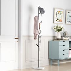 a coat rack in the corner of a room