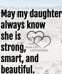 a woman standing on top of a sandy beach next to a heart shaped sign that reads, may my daughter always know she is strong, strong, smart, and beautiful