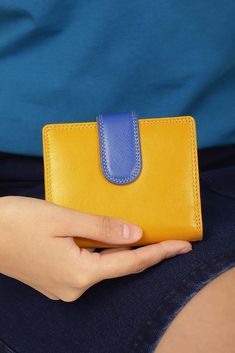 This Leather Wallet for Women makes a thoughtful personalised purse and coin pouch, featuring a zipped credit card wallet and RFID protection. It's a stylish yellow wallet, perfect as a birthday gift for her or a special gift for grandma. DETAILS ❤️ Style: Trifold Purse 👜 Material: Leather 🔒 RFID Protection 🔗 Secure Tab Fastener 💳 9 Card Slots 🆔 ID Window 💵 Note Compartment 💰 Zipped Coin Pocket 🎁 Gift Boxed 📏 DIMENSIONS: 3.7" / 9.5cm x 4.5" / 11.5cm x 1.5" / 4cm ⚖️ Weight: 180g SHIPPING Yellow Coin Purse With Card Slots As Gift, Yellow Card Holder With Card Slots As Gift, Yellow Rectangular Wallet With Rfid Blocking, Multicolor Card Holder For Gift, Bifold Wallet With Zipper Closure For Gift, Rectangular Wallets With Zipper Closure As Gift, Rectangular Zipper Wallet As Gift, Blue Bifold Coin Purse For Gift, Yellow Wallets With Card Slots For Daily Use