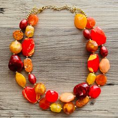 One of a kind! Beautiful styles of acrylic beads on a chunky beaded necklace. You could say it's "gourd-geous"!  ... I'll see myself out ️  16 Inch Necklace with a 4 inch gold extender chain and gold lobster clasp. Thank you for supporting American small business! 100% handmade. *Smoke and pet free home!* Hate to wait? Me too! I ship 6 days a week. Thank you for browsing my store! Check out my other items here: https://www.etsy.com/shop/PolkaDotDrawer?ref=si_shop Vibrant Orange Handmade Necklace, Handmade Orange Resin Necklace, Beaded Orange, Fall Necklace, Autumn Necklace, Orange Necklace, Halloween Necklace, 16 Inch Necklace, Jewelry Resin