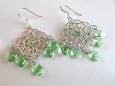 "Chandelier earrings, peridot earrings Gorgeous earrings featuring silver filigrees pairing with Swarovski peridot beads, they completed on quality silver earwires. EARRINGS measure 2\" Earrings Collection https://www.etsy.com/shop/minieglamstudio?section_id=7077498 ♥Free gift wrapping is available upon request, please leave me a message to seller at the check out. Thanks for stopping by! If you need custom order, feel free to contact Minie Glam Studio. Have a nice day" Green Filigree Dangle Jewelry, Elegant Silver Earrings With Bead Caps, Green Chandelier Earrings As Gift, Green Teardrop Chandelier Earrings Nickel Free, Green Teardrop Nickel-free Chandelier Earrings, Green Ornate Filigree Earrings, Ornate Green Filigree Earrings, Green Dangle Jewelry With Bead Caps, Green Filigree Drop Earrings