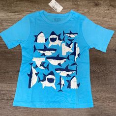 Children’s Place Boys Shark T-Shirt Tee Brand New With Tags Available In Size 2t, 3t, 4t *Final Price* Inventory B22 Blue Shark Design Short Sleeve Tops, Casual Summer T-shirt With Shark Design, Casual Short Sleeve T-shirt With Shark Design, Blue Short Sleeve T-shirt With Shark Design, Shark T Shirt, Playful Cotton T-shirt With Dinosaur Print, Childrens Place, Kids Shirts, Kids Shop