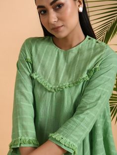 Green Asymmetrical Cotton Top with Tassels By The Neem Tree now available at Trendroots Kurta Pattern, Teenage Dress, Tassel Lace, Western Top, Kurta Patterns, Designer Kurti Patterns, Kurti Designs Latest, Kurti Embroidery Design, Cotton Kurti Designs