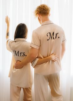 "Mr and Mrs Satin Pajamas for Couples, Custom Satin Pajamas, Honeymoon Pjs , Groom and Bride Pjs, Gift for Her/Him,Wedding pjs for couple S+L Are you getting ready for your honeymoon or anniversary? Stop by here and order your matching couples pajamas - we will customize them just the way you like it. Whether these are wedding pjs or regular his and hers pjs, they are so high-quality, that anybody wearing them will feel like a first-time groom and bride. Great gift for newlyweds, Birthday, Weddi Mr And Mrs Pajamas, Just Married Pajamas, Honeymoon Pjs, Matching Couples Pajamas, Couples Pyjamas, Bride Pjs, Wedding Pjs, Pajamas For Couples, Matching Couple Pajamas