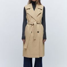 Sleeveless Trench Coat Style Vest With Lapel Collar. Front Welt Pockets. Double Breasted Front Button Closure And Tonal Belt. Sleeveless Trench Coat Outfits, Sleeveless Trench Coat, Trench Vest, Sleeveless Trench, Rain Trench Coat, Trench Coat Outfit, Tan Coat, Denim Trench Coat, Trench Dress