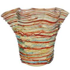 the vase is made out of glass and has multicolored stripes on it