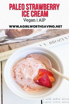 a bowl of ice cream with strawberries in it and the text paleo strawberry ice cream vegan aip