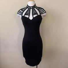 Size: Small Materials: 68% Rayon 27% Nylon 5% Spandex Black High Neck Bodycon Dress For Party, Black High Neck Bodycon Party Dress, Black High-neck Bodycon Dress For Evening, Black High Neck Bodycon Dress For Evening, Black Stretch Midi Bandage Dress, Black High Neck Mini Dress For Summer, Black Bandage Dress For Spring Cocktail, Spring Cocktail Black Bandage Dress, Black Stretch Bandage Dress For Evening