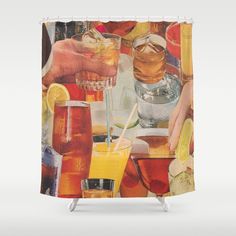 a shower curtain with drinks on the table and people holding their hands up to drink