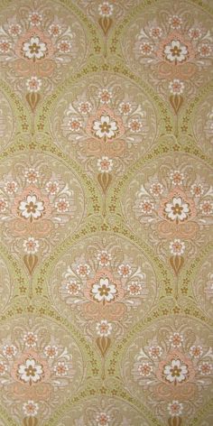 an old wallpaper pattern with flowers and leaves