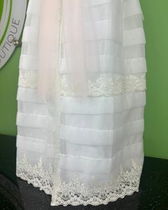 Made in Spain Dry Clean 50% Cotton, 50% Polyester Final sale, no exchanges nor returns are available Elegant White Gown With Lace Trim, White Dress For First Communion In Spring, Elegant First Communion Gown For Spring, Elegant White First Communion Dress For Spring, Elegant Spring Gown For First Communion, White Full Length Spring Dresses, Elegant White Baptism Dress For Spring, Elegant Cream First Communion Dress For Spring, Fitted Gown For Spring Confirmation