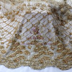 Price: The price is for 1yard.1 yard=125cm wide*91cm length,if you buy more than 1 yard,it don't cut , in one piece the longest is 15 yards. we also make wholesale, wholesale start 15 yards. Material: beads,metallic,pearls ,polyester Wide : 125cm (or 49 inches) color: Gold Shipping: shipping by China post air mail;if you need ship by other way,just contact me Use for Dress,clothing and some others Rim: two sides are flowers shape Very importantwhen you make an order,please write down you phone N Elegant Embroidered Lace Fabric For Celebration, Gold Lace Fabric With Pearl Embroidery, Festive Embroidered Tulle Fabric, Elegant Embroidered Fabric With Lace Work For Banquets, Elegant Embroidered Fabric With Lace Work For Banquet, Beige Pearl Embroidered Fabric For Party, Beige Embroidered Fabric With Pearl For Party, Beige Embroidered Fabric With Pearl Embroidery For Party, Gold Embroidered Fabric For Evening