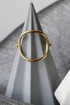 Make a simple statement with our Open Circle Ring. Crafted from stainless steel, this minimalistic ring adds a touch of geometric flair to any outfit. Perfect for those who appreciate understated style. Tarnish Proof Comes in a suede cinched pouch Adjustable Modern Midi Rings, Modern Metal Midi Rings, Minimalist Metal Rings With Simple Design, Minimalist Circle Midi Rings For Everyday, Minimalist Midi Rings For Everyday, Minimalist Open Circle Midi Rings For Everyday, Modern Metal Midi Rings For Formal Occasions, Minimalist Metal Midi Rings, Minimalistic Ring